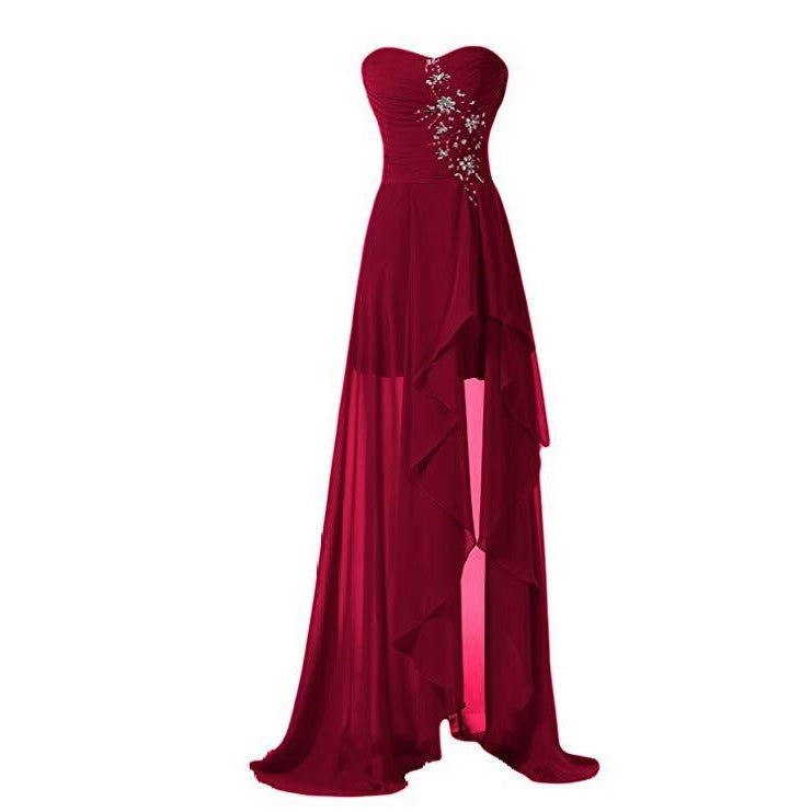 Elegant strapless bridesmaid dress long in burgundy with a flowing high-low hem and embellishments