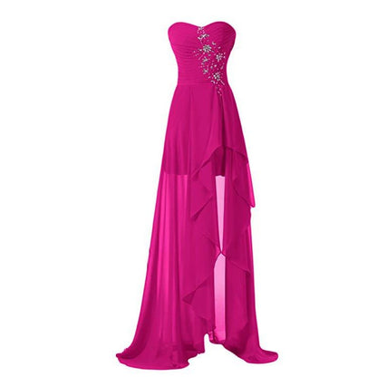 Pink strapless bridesmaid dress long with a flowing high-low design and beaded detailing