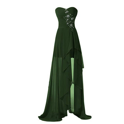 Elegant strapless bridesmaid dress long in dark green with a flowing design and embellished details