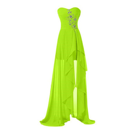 Strapless bridesmaid dress long in vibrant green with a flowing high-low hem and floral embellishments