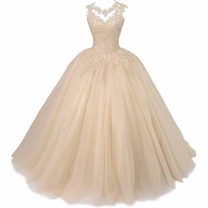Elegant sweet 16 ball gown for women featuring a lace bodice and flowing tulle skirt in soft beige