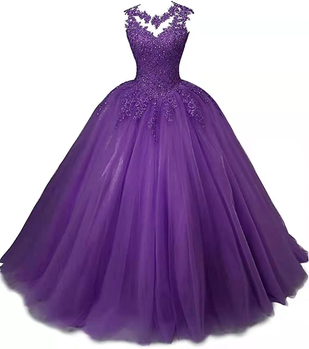 Elegant purple sweet 16 ball gown for women with intricate beading and a voluminous skirt
