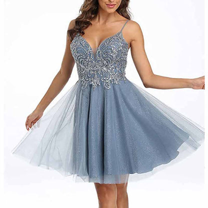 Beautiful blue tulle homecoming dresses for teens with delicate beading and a flowing skirt