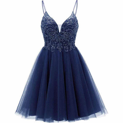 Navy blue tulle homecoming dress for teens with intricate beaded bodice and spaghetti straps