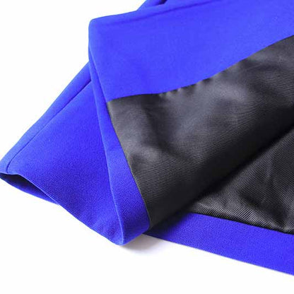 Close-up of a vibrant blue one button blazer and flare pants set showcasing fabric detail and stitching