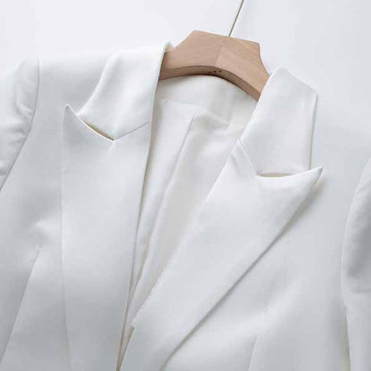 Elegant Tucomosi women's wedding suit with feathers in white, featuring a tailored design and chic silhouette