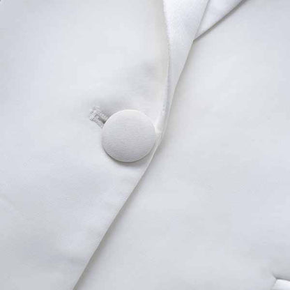 Elegant white Tucomosi women's wedding suit with feathers featuring a classic button design