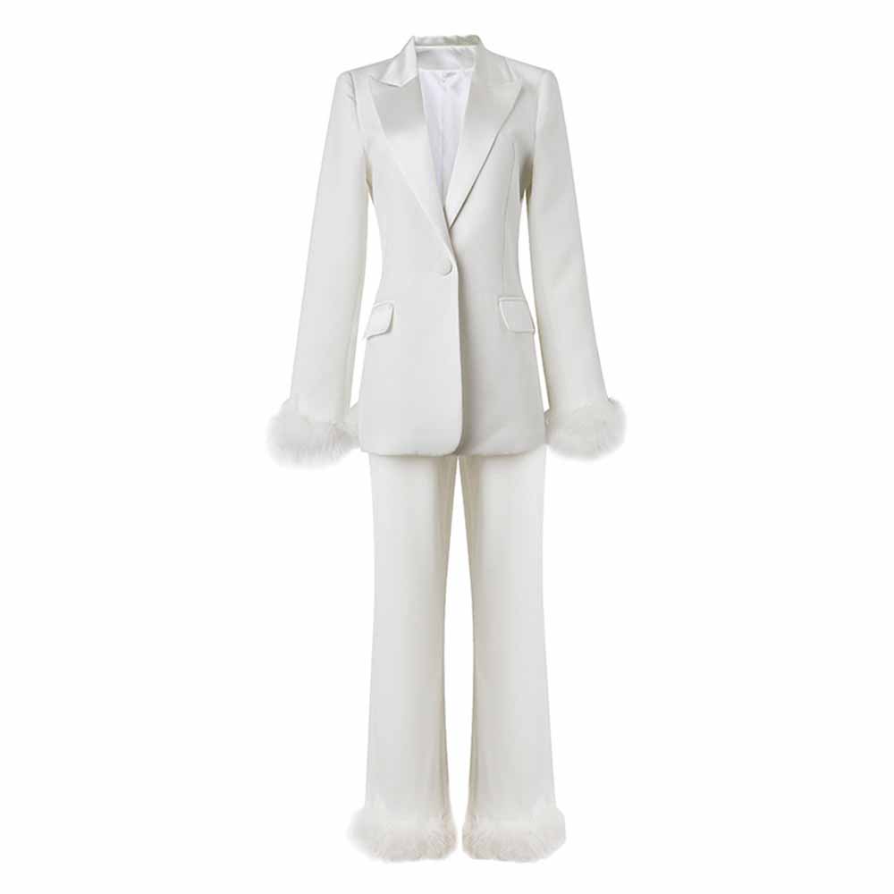 Elegant women's wedding suit with feathers featuring a tailored blazer and matching trousers
