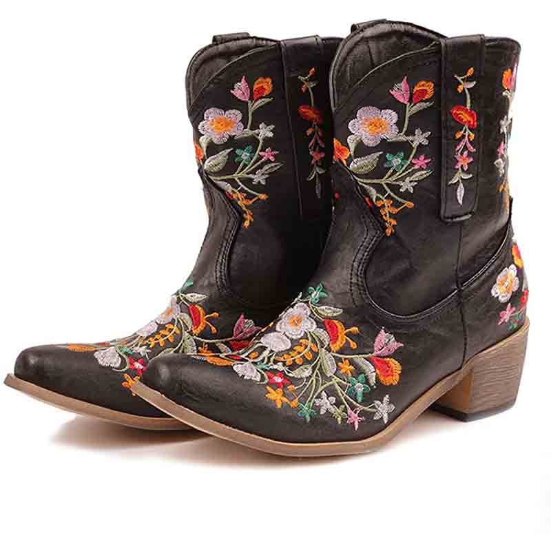 Vintage flower embroidered cowgirl boots featuring colorful floral designs on black leather