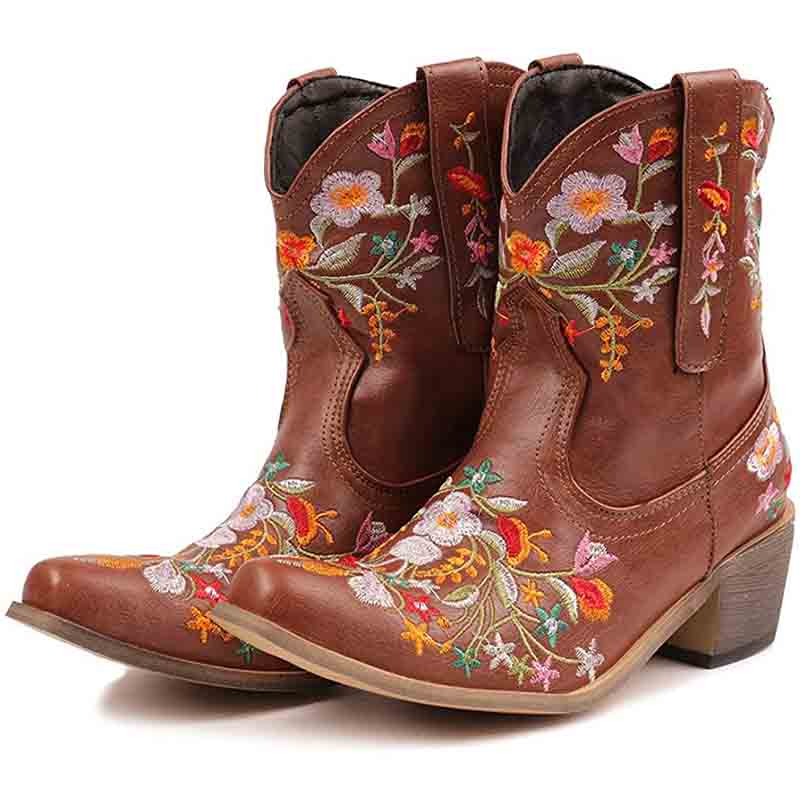 Vintage flower embroidered cowgirl boots with colorful floral designs and a stylish western heel