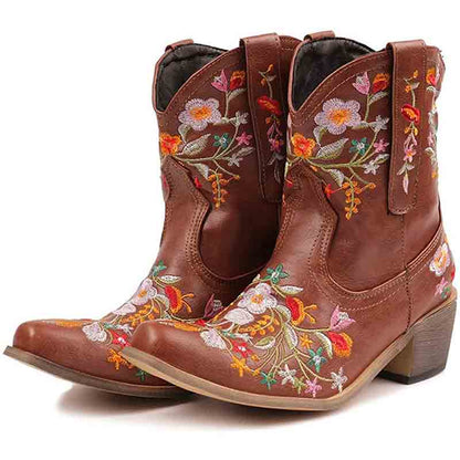 Vintage flower embroidered cowgirl boots with colorful floral designs and a stylish western heel