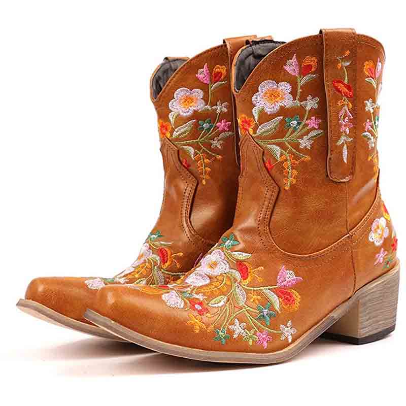 Vintage flower embroidered cowgirl boots in tan with colorful floral designs for a stylish western look