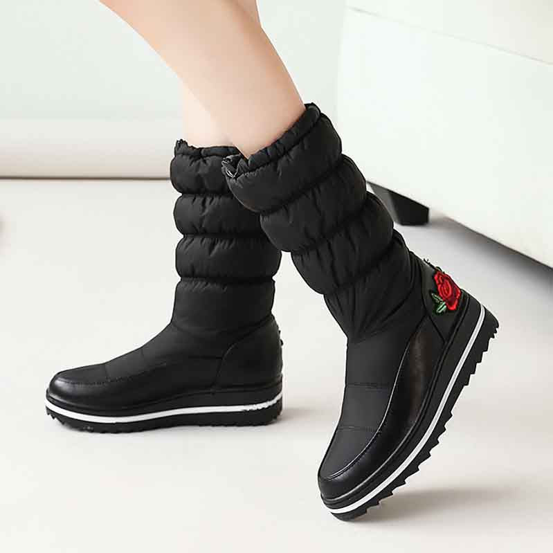 Tucomosi waterproof womens snow boots with quilted design and rose detail for winter wear