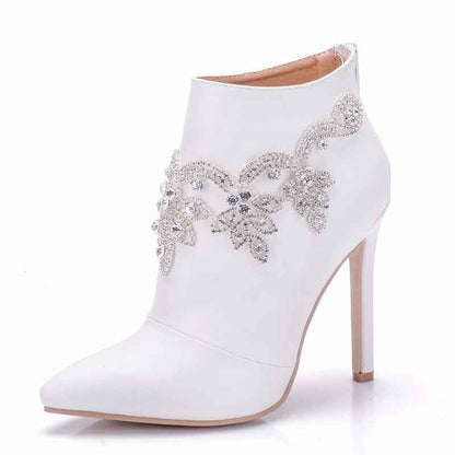 Elegant white ankle boots for women with sparkling beaded details and a stylish high heel