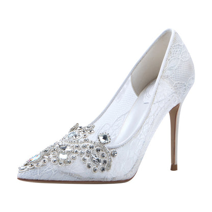 White rhinestone bridal wedding shoes with intricate lace design and high stiletto heels