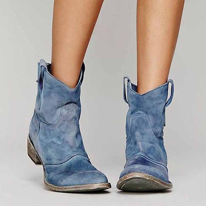 Stylish blue low heel ankle booties for women with easy pull-on design and soft suede finish