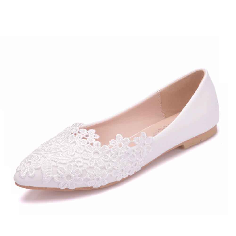 Women's bridal flats in white with floral lace embellishments for elegant wedding wear