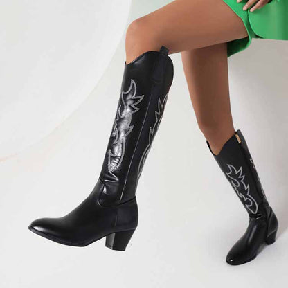 women's embroidered cowboy boots in black with stylish design details and a sleek silhouette