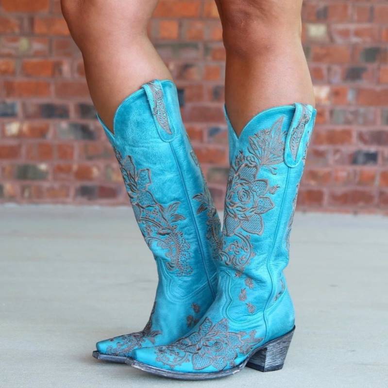 Women's embroidered cowboy boots in turquoise with floral designs and stylish stitching