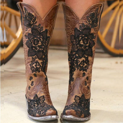 Women's embroidered cowboy boots with detailed floral designs and a stylish pointed toe