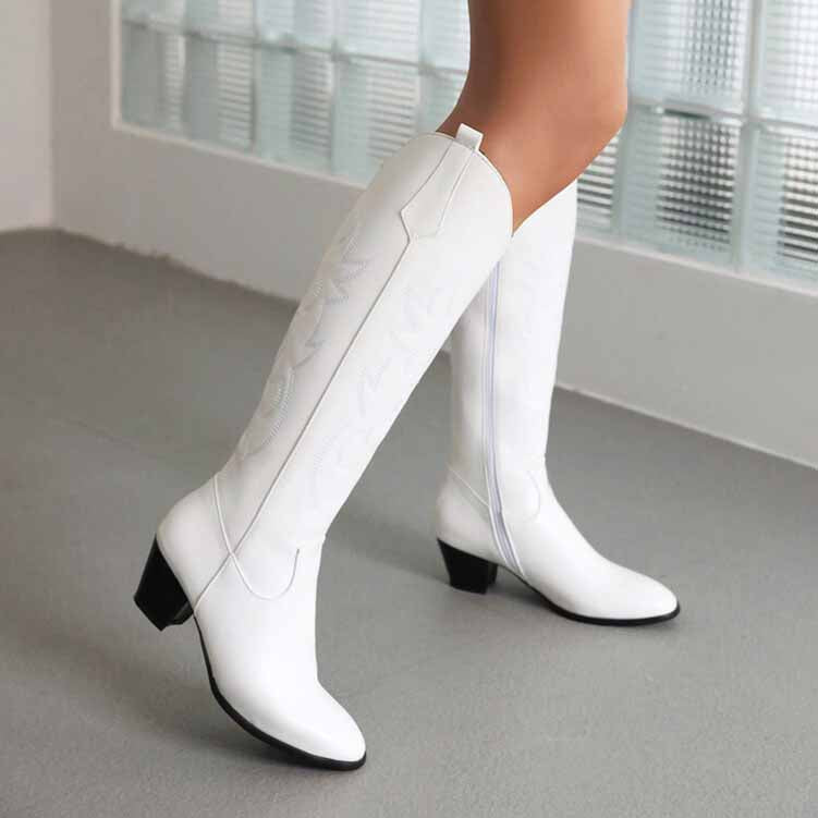 women's embroidered cowboy boots in white with elegant stitching and a stylish heel