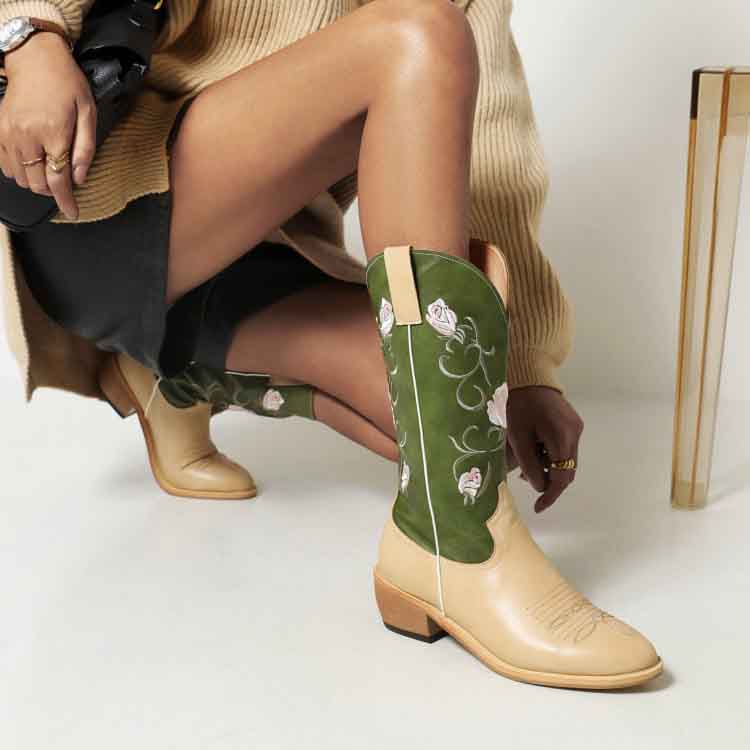 Stylish women's embroidered cowgirl boots in beige and green with floral details for trendy outfits