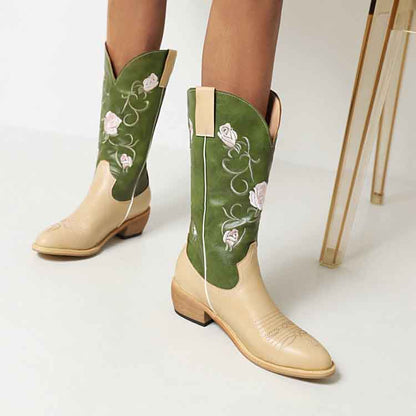 Stylish women's embroidered cowgirl boots in beige and green with floral designs on the shaft