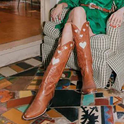 Stylish women's embroidery heart cowgirl boots in tan leather, perfect for fashionable outfits