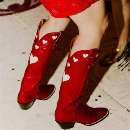 Women's embroidery heart cowgirl boots in red with white heart designs for a trendy western look