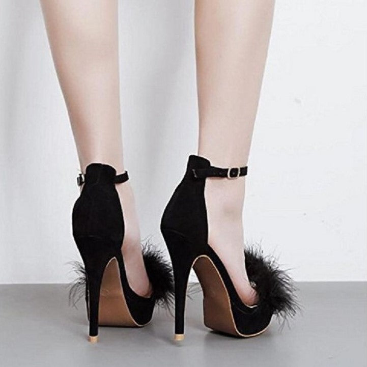 Stylish women's feather party pumps in black suede with high heels and ankle straps