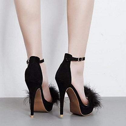 Stylish women's feather party pumps in black suede with high heels and ankle straps