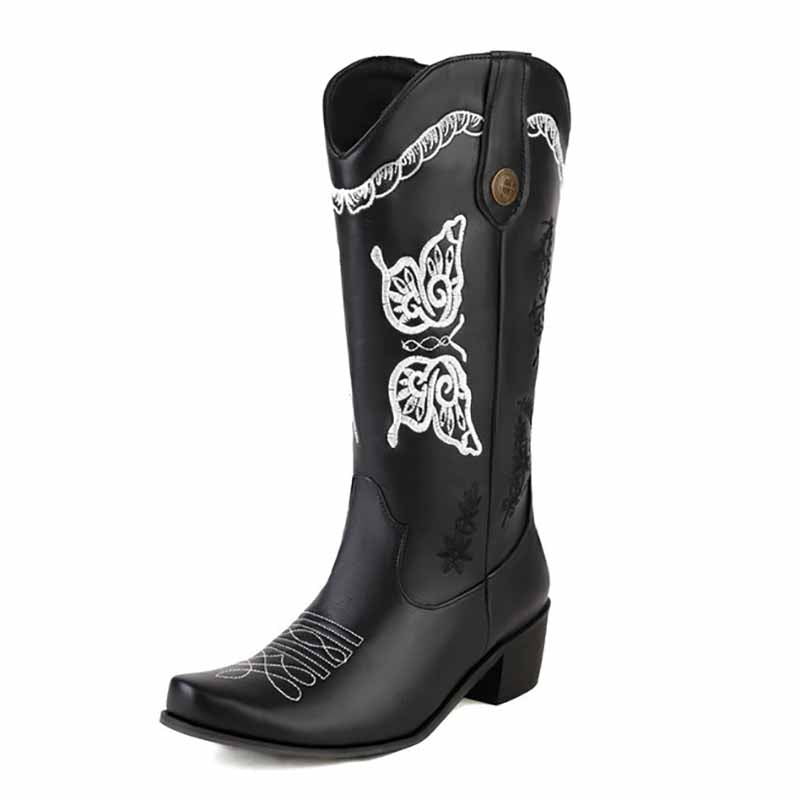 Tucomosi women's floral embroidery cowgirl boots in black with intricate white floral designs
