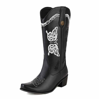 Tucomosi women's floral embroidery cowgirl boots in black with intricate white floral designs