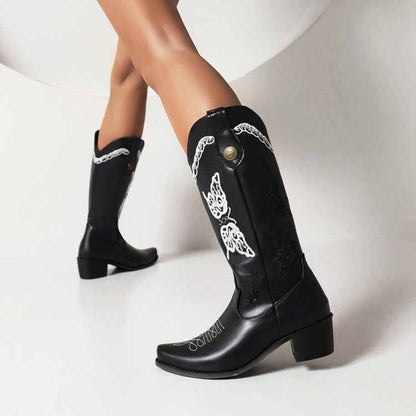 Tucomosi women's floral embroidery cowgirl boots with intricate black and white detailing for stylish Western wear