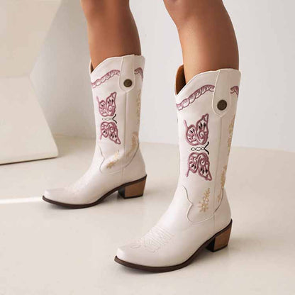 Tucomosi women's floral embroidery cowgirl boots in white with colorful butterfly designs