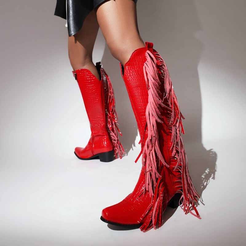 Bold red women's fringe cowgirl boots with a stylish fringe design and high heel, perfect for fashion-forward outfits