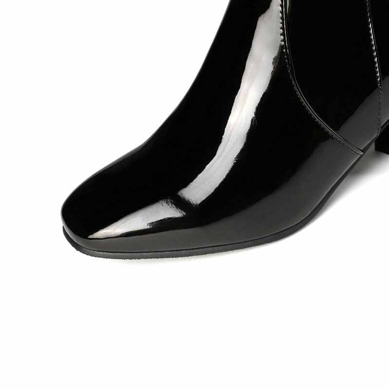 Stylish shiny black women's knee high boots for trendy fall and winter outfits