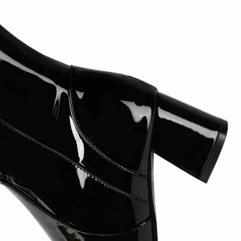 Stylish black women's knee high boots with glossy finish and chunky heel for modern fashion.