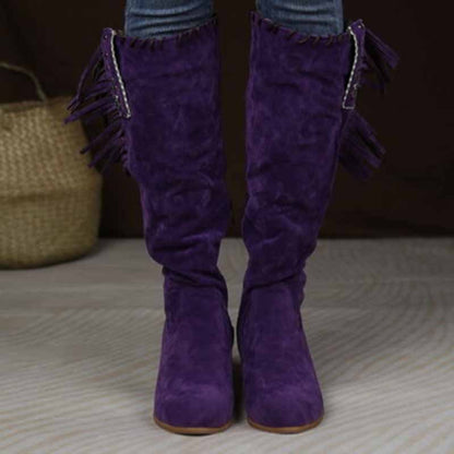 Purple women's knee high cowgirl boots with fringe detailing for a stylish Western look