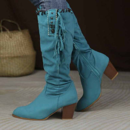 Stylish women's knee high cowgirl boots in turquoise with fringe and button details 