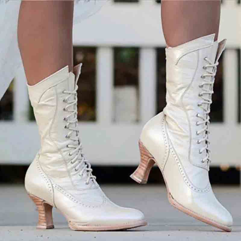 Elegant women's lace up bridal boots with a vintage design and stylish heel for wedding attire