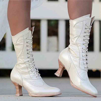 Elegant women's lace up bridal boots with a vintage design and stylish heel for wedding attire