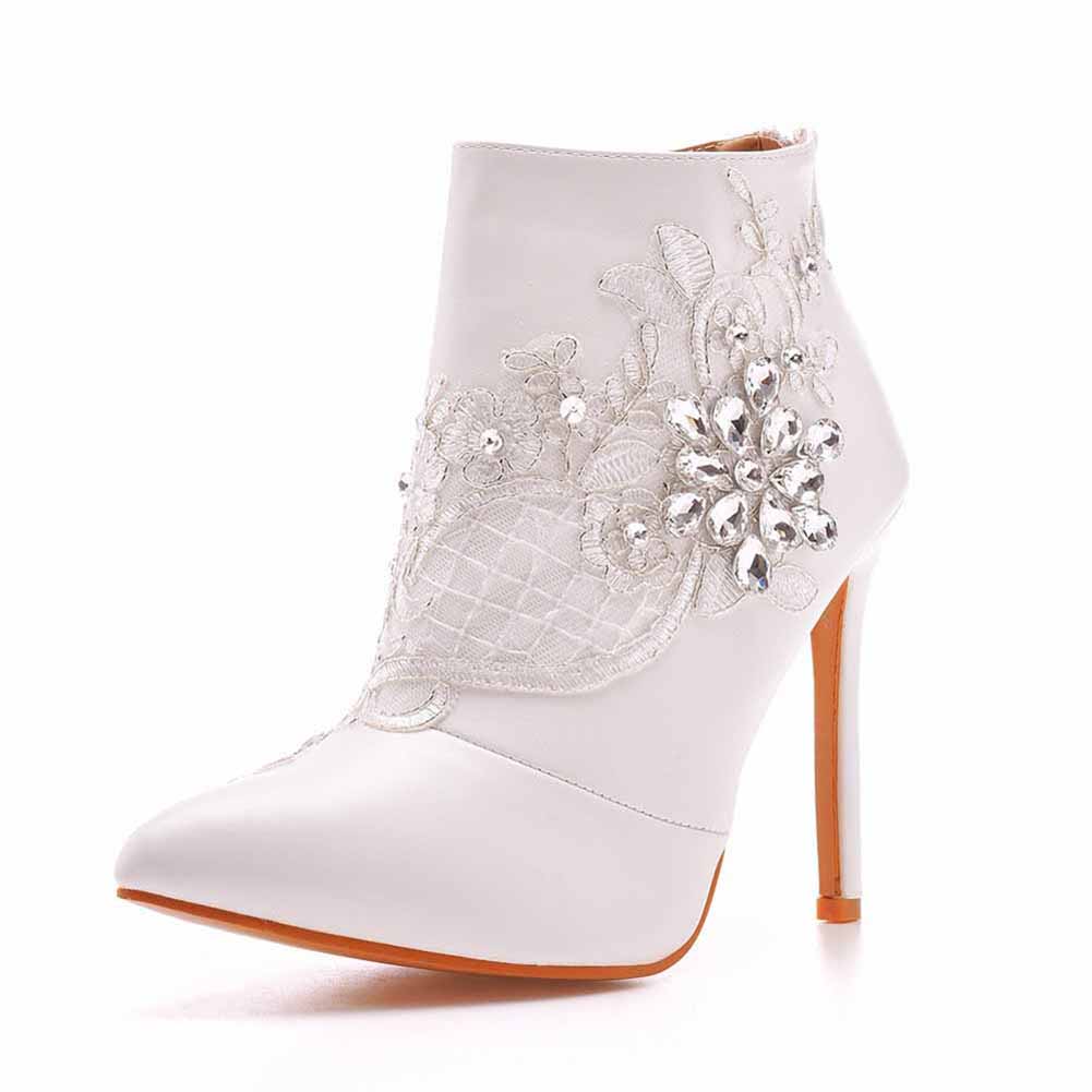 Women's lace wedding boots with elegant embellishments and a pointed toe design