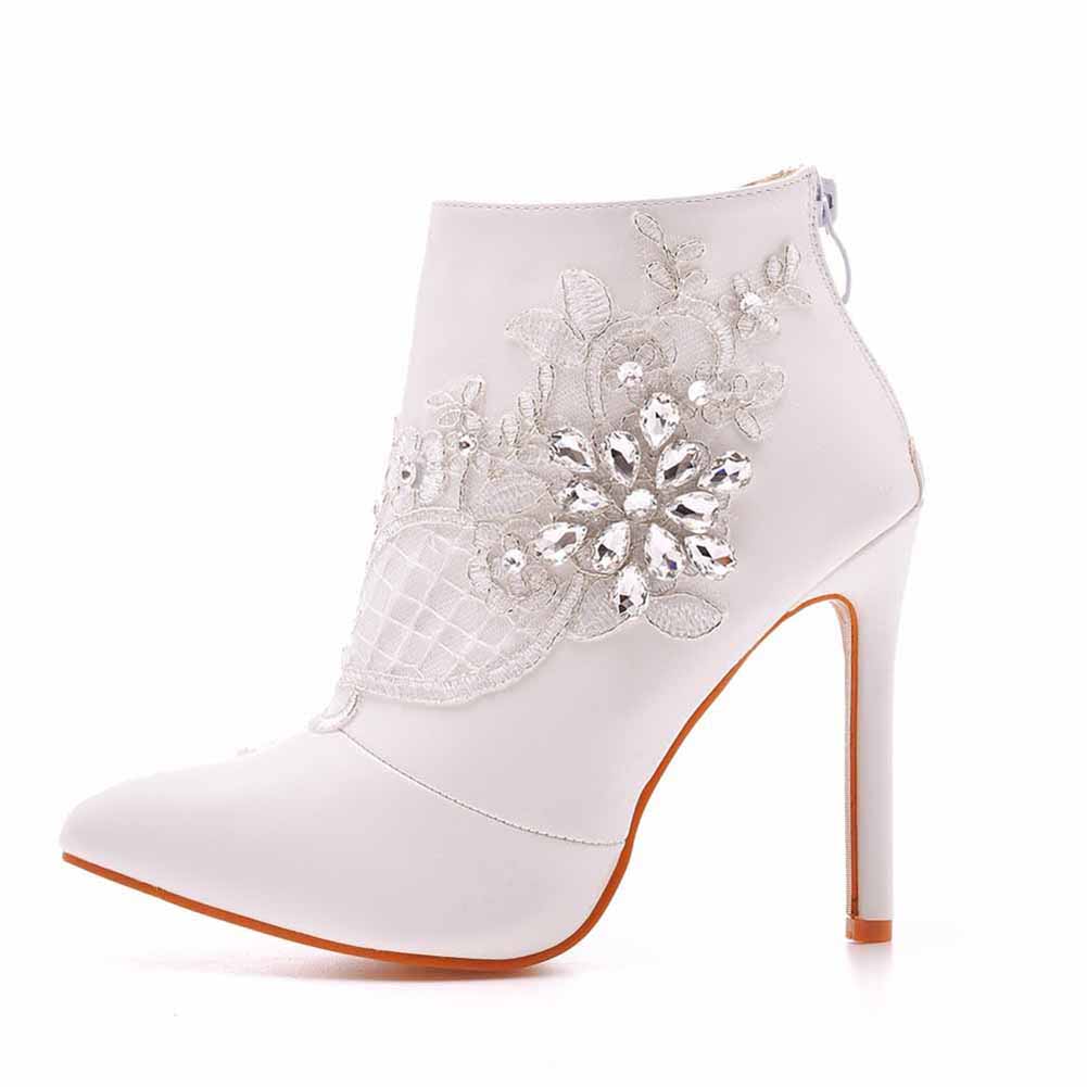 Elegant white women's lace wedding boots with floral embroidery and high heels for brides