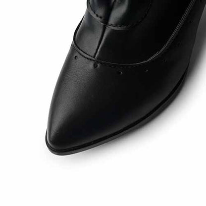 Stylish black women's low heeled wedding boots featuring a pointed toe design