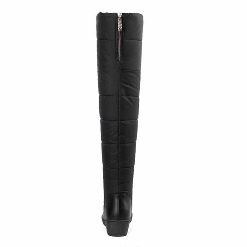 Womens over the knee snow boots with quilted design and stylish high heel