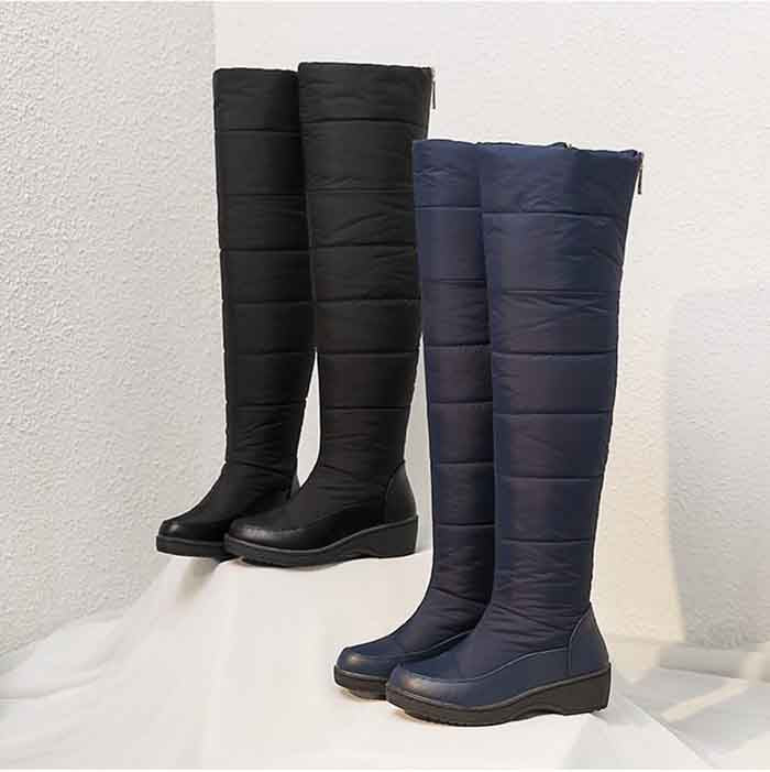 Womens over the knee snow boots in black and navy for stylish winter warmth