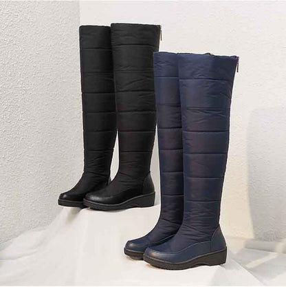 Womens over the knee snow boots in black and navy for stylish winter warmth