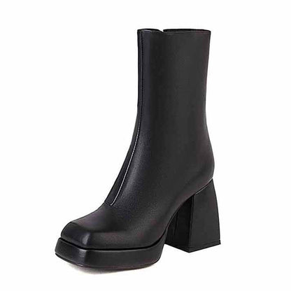 Stylish women's patent leather ankle boots with chunky block heels for a fashionable look
