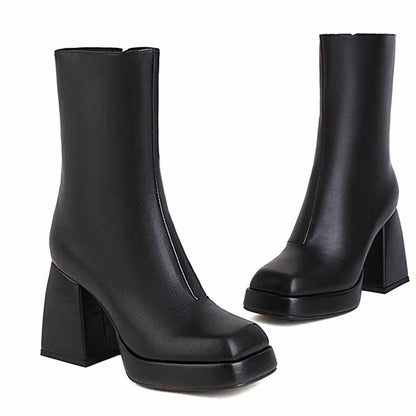 Stylish women's patent leather ankle boots with a chunky heel for a modern look
